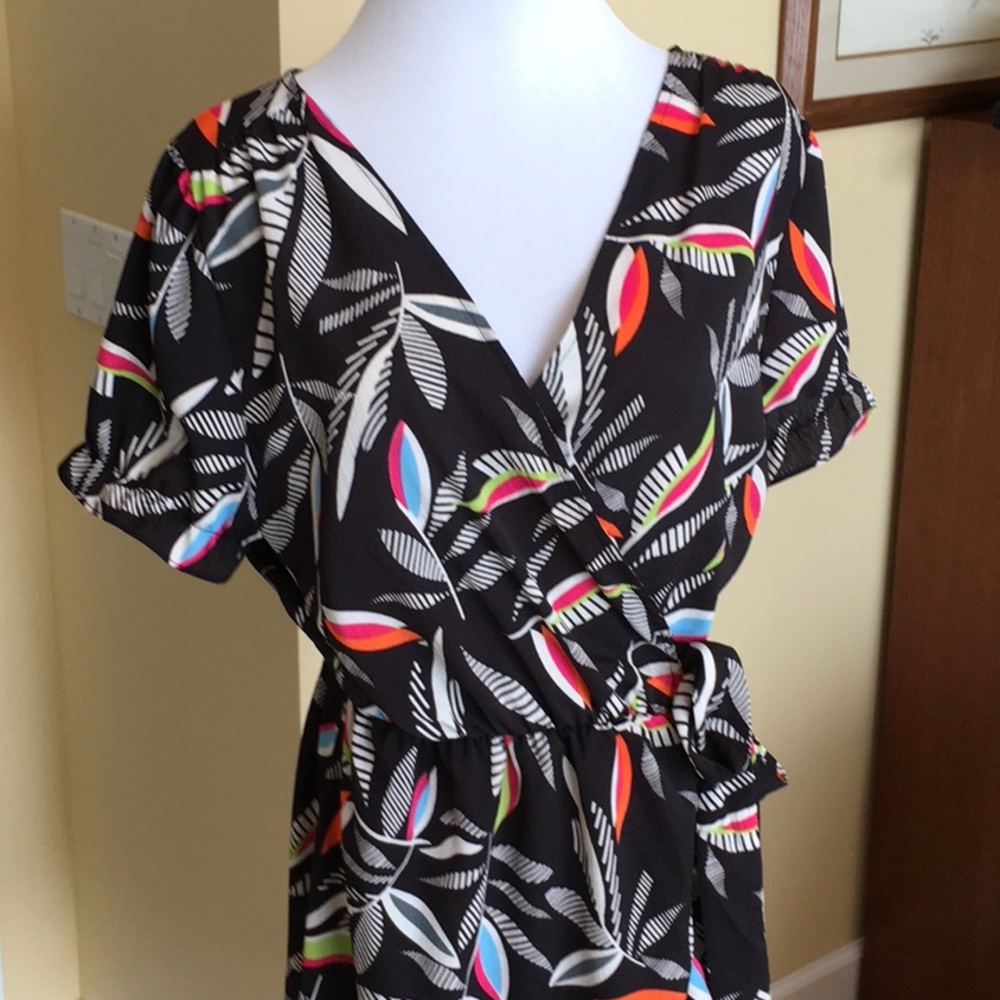 NWT vibrant wrap dress with ruffle hem.